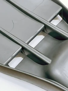 Vented rubber fins
